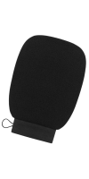 A white and black box beside a black exfoliating mitt